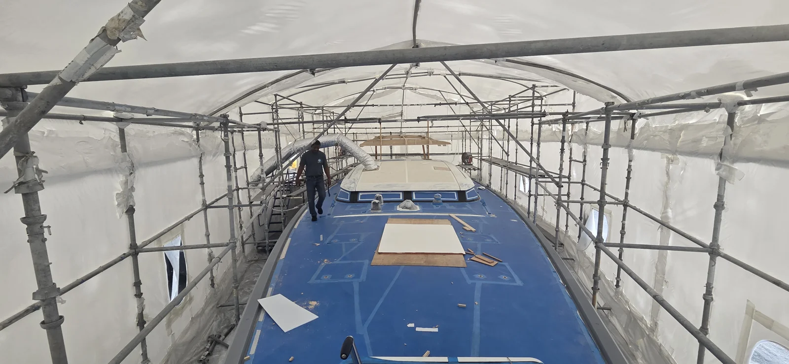 Covered work area aboard a yacht